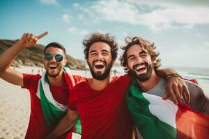 portugués playa fútbol aficionados celebrando un victoria foto