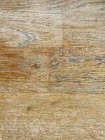 Wood under old varnish. Texture of wood with old varnish. Vintage wood background photo
