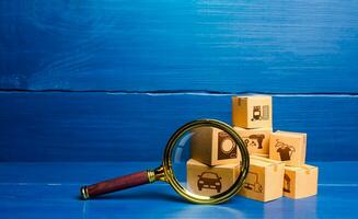 Cardboard boxes and magnifying glass. Monitoring and verification of goods, import certification. Quality control. Consumer market research. Customs clearance. Antimonopoly. Inventory. Cargo tracking photo