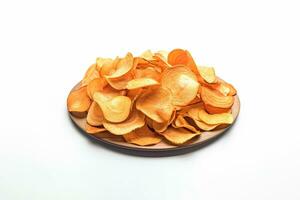 Crispy fried potato chips on a plate isolated on a white background. ai generated photo