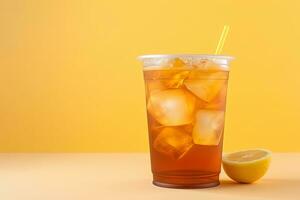 Iced lemon tea on plastic takeaway glass. ai generated photo