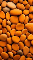 Pebbles stones background with orange toned. ai generated photo