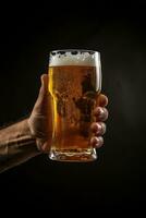 a male hand holding up a glass of beer isolated on a black background. ai generated photo