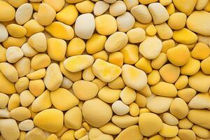 Pebbles stones background with yellow toned. ai generated photo