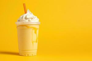 Mango smoothie milkshake in plastic takeaway cup isolated on yellow background with copy space. ai generated photo