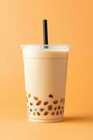 iced milk tea and bubble boba in the plastic glass on the beige background. ai generated photo