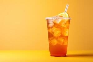 Iced lemon tea on plastic takeaway glass. photo
