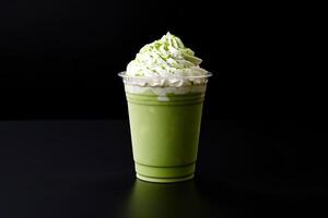 Green tea frappucino with whipped cream in a takeaway cup isolated on dark background. ai generated photo