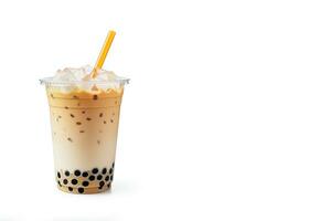 iced milk tea and bubble boba in the plastic glass on the white background with copy space. ai generated photo