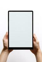 Hand holding tablet with mockup blank screen isolated on white background. ai generated photo