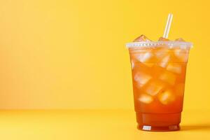 Iced lemon tea on plastic takeaway glass. ai generated photo