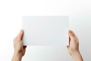 A human hand holding a blank sheet of white paper or card isolated on white background. ai generated photo