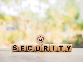 Wooden block with word SECURITY and security lock icon. The concept of private protection data and security for everything. photo