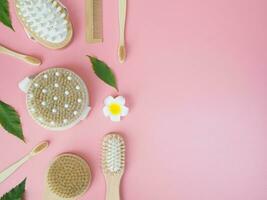 Directly above view of spa products on pink background, Healthcare spa concept with copy space photo