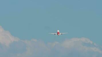 Unrecognizable plane takeoff, climb. Long shot rear view of a passenger plane flying away. Airliner in blue cloudy sky. Tourism and travel concept video