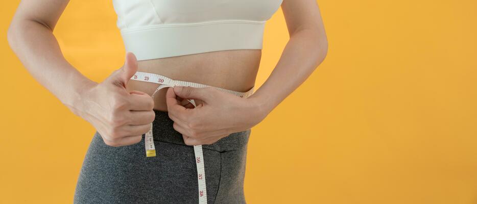 Diet and dieting. Beauty slim female body use tape measure. Woman in  exercise clothes achieves weight loss goal for healthy life, crazy about  thinness, thin waist, nutritionist. Fitness 25025259 Stock Photo at