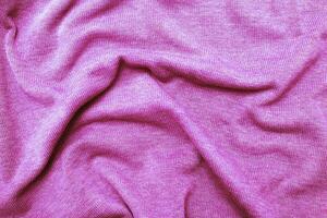 burgundy viva magenta wrinkled plush fabric background texture, soft material pattern photo