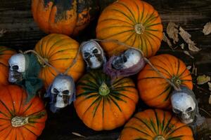 halloween decoration with pumpkins and skull photo