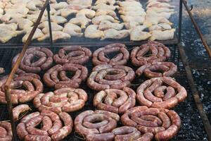 traditional meat grilled on the grill in the Argentine countryside photo