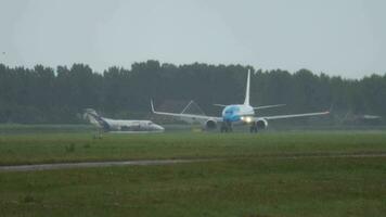 AMSTERDAM, THE NETHERLANDS JULY 24, 2017 - Boeing 737, PH BXW of KLM acceleration and take off at Amsterdam Airport, side view. Passenger flight KLM departure. Tourism and travel concept video