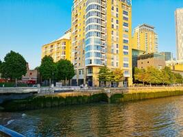 Low Angle View of Canary Wharf Buildings at Central London City of England Great Britain. The Footage Was Captured on June 8th, 2023 During Clear Sunny Day. High Resolution 64 Mega Pixels Image photo