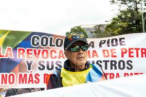 Bogota, Colombia, 16 August 2023. March asking for Gustavo Petro impeachment. Peaceful protest march in Bogota Colombia against the government of Gustavo Petro called La Marcha de la Mayoria. photo