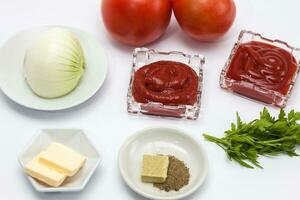 Ravioli Preparation. Ingredients to prepare ravioli tomato sauce. Neapolitan sauce photo