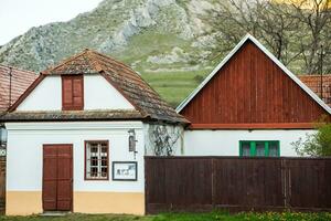 Rimetea is a small village located in Transylvania, Romania. It is situated in the Apuseni Mountains and is known for its picturesque setting and well preserved Hungarian architectural style. photo