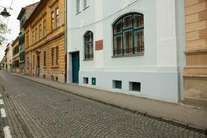 Medieval street with historical buildings in the heart of Romania. Sibiu the eastern European citadel city. Travel in Europe photo