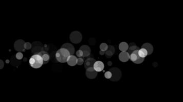 abstrait blanc briller et particule sur noir Contexte. en boucle animation avec magnifique blanc bokeh sur noir Contexte. video