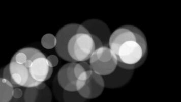 abstrait blanc briller et particule sur noir Contexte. en boucle animation avec magnifique blanc bokeh sur noir Contexte. video