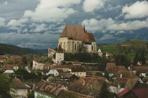 Biertan a very beautiful medieval village in Transylvania, Romania. A historical town in Romania that has preserved the Frankish and Gothic architectural style. Travel photo. photo