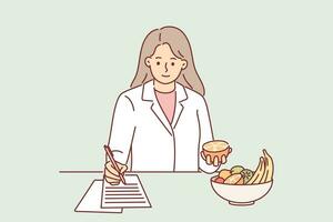 Woman nutritionist makes diet plan for patient who wants to lose weight and stands at table with fruits. Girl in white coat works as nutritionist making notes on piece of paper with diet strategy vector