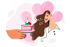 Woman celebrating birthday blows out candle on cake and makes wish while standing near festive balloons. Hands with cake for traditional ritual for birthday party with hope of fulfillment of desires vector