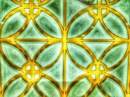 The art of geometric ornament, can be used for any decoration, the color combination is gold, green, white photo