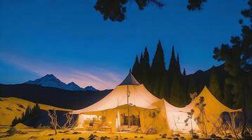 Camping in the mountains at sunset. photo