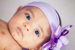 Portrait of a beautiful four months baby girl photo
