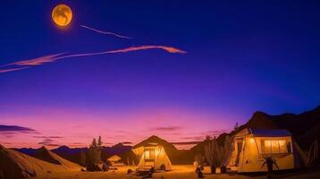 Camping in the mountains at sunset. photo
