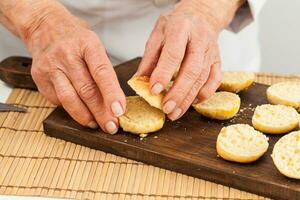 Step by step preparation of mini burgers. Homemade mini burgers for children or appetizers. Small hamburgers. Assembling burgers photo