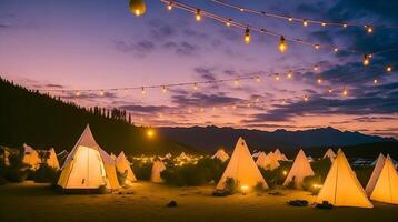 Camping in the mountains at sunset. photo