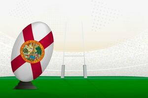 Florida national team rugby ball on rugby stadium and goal posts, preparing for a penalty or free kick. vector