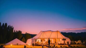 Camping in the mountains at sunset. photo