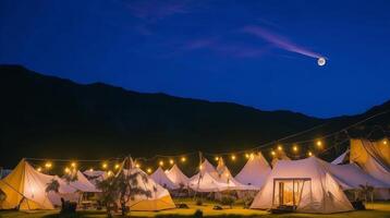 Camping in the mountains at sunset. photo