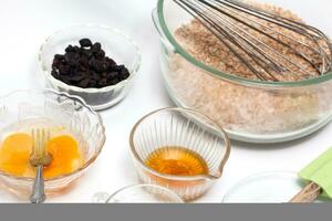 Wheat bran muffins preparation. Mixing ingredients to prepare integral wheat bran muffins photo