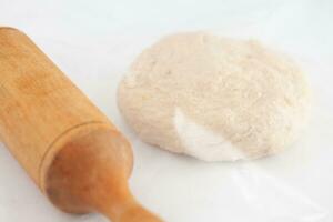 Pizza dough ball ready to stretch. Pizza dough ingredients. Pizza preparation. photo