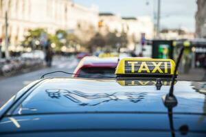 Taxi car cab somewhere on the street waiting for a passenger photo