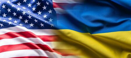 US flag together with Ukrainian flag in a single picture, flags blending one into the other photo
