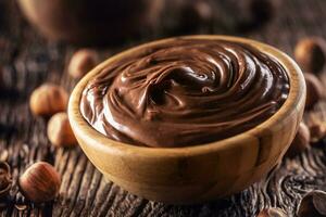 Chocolate hazelnut spread in wooden bowl - Close up photo