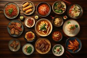 Asian Traditional Dishes on Wooden Table photo