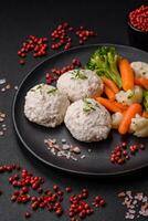 Delicious healthy steamed chicken cutlets or minced meatballs photo